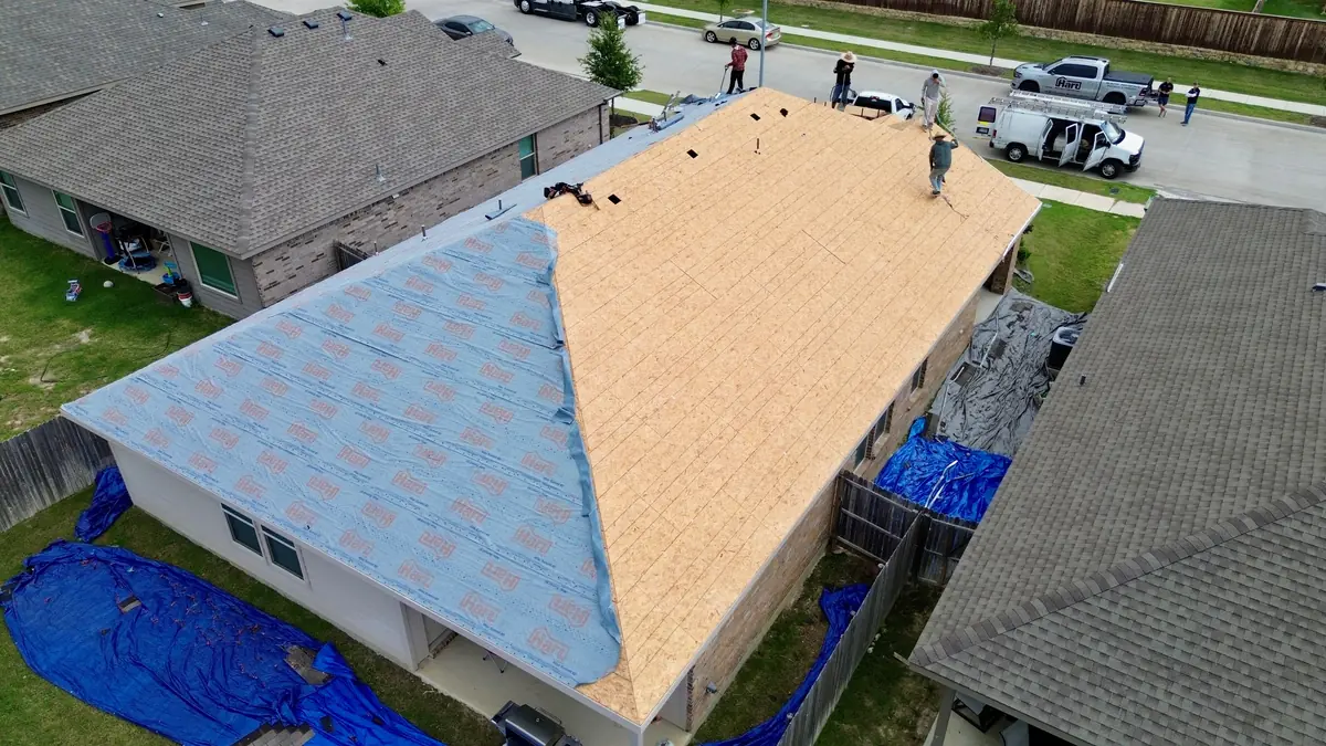 Aerial photo of a Hart Roofing job in the DFW area with new decking and underlayment installed